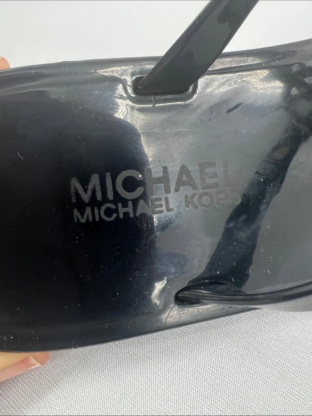 Michael Kors Black Gloss Jelly Logo Thong Sandals with Gold Accents - Picture 3 of 6